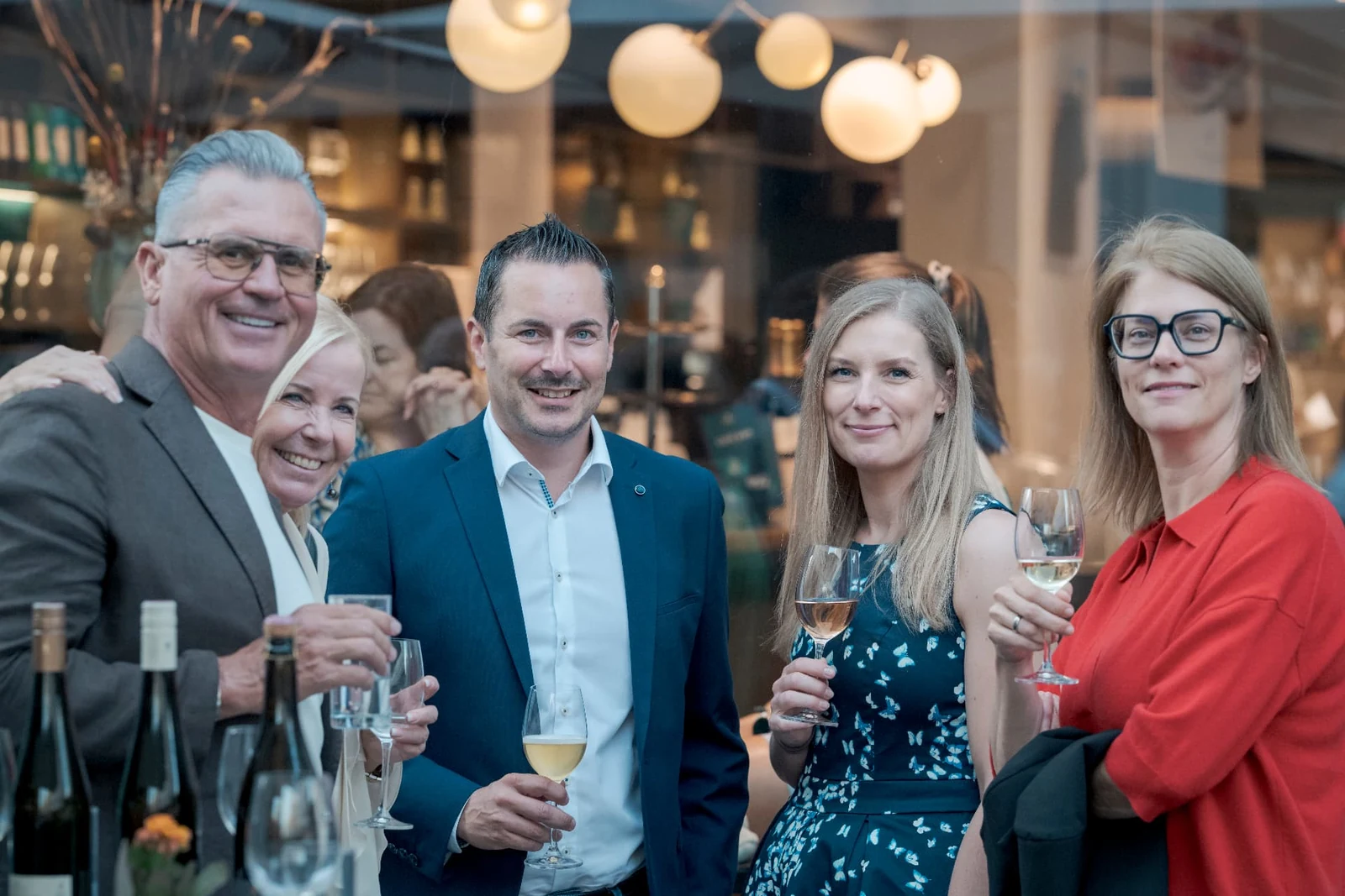 Guests from retail and industry at a summer gathering in Vienna