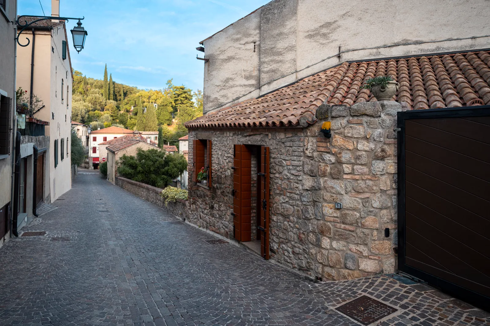 Narrow historic stone lane on the slope of Arquà Petrarca