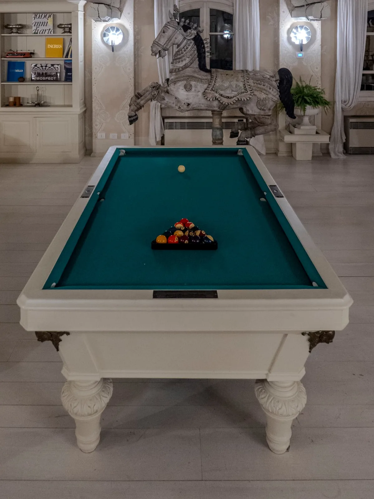 Billiard table and horse sculpture at the Elizabeth Country House